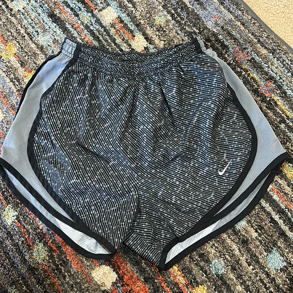 Grey and black Nike athletic shorts